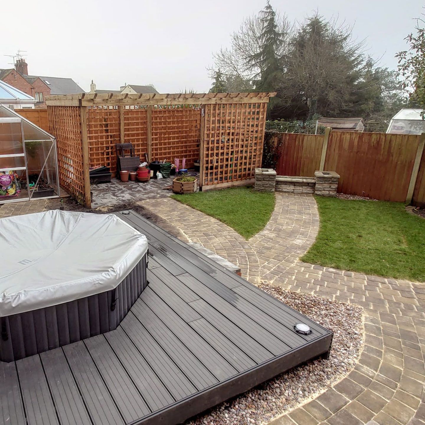 DNA Landscaping Long Itchington garden with composite decking in a garden