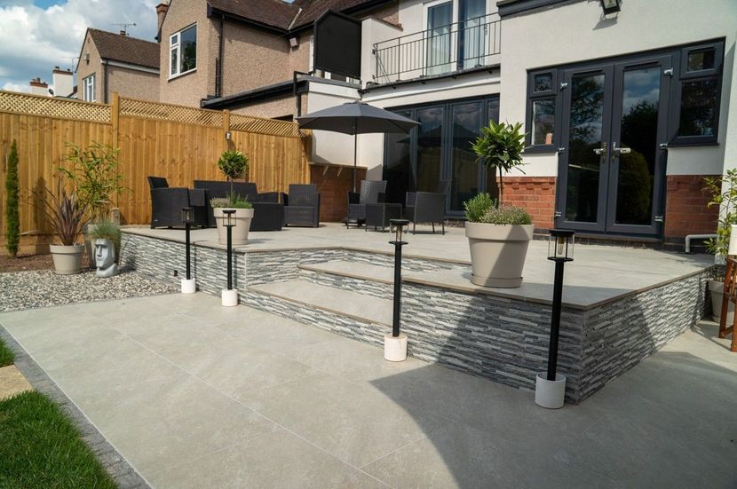 DNA Landscapes full garden design and build project completed in Earlsdon, Coventry. Includes patio, paving, garden lighting, garden fencing