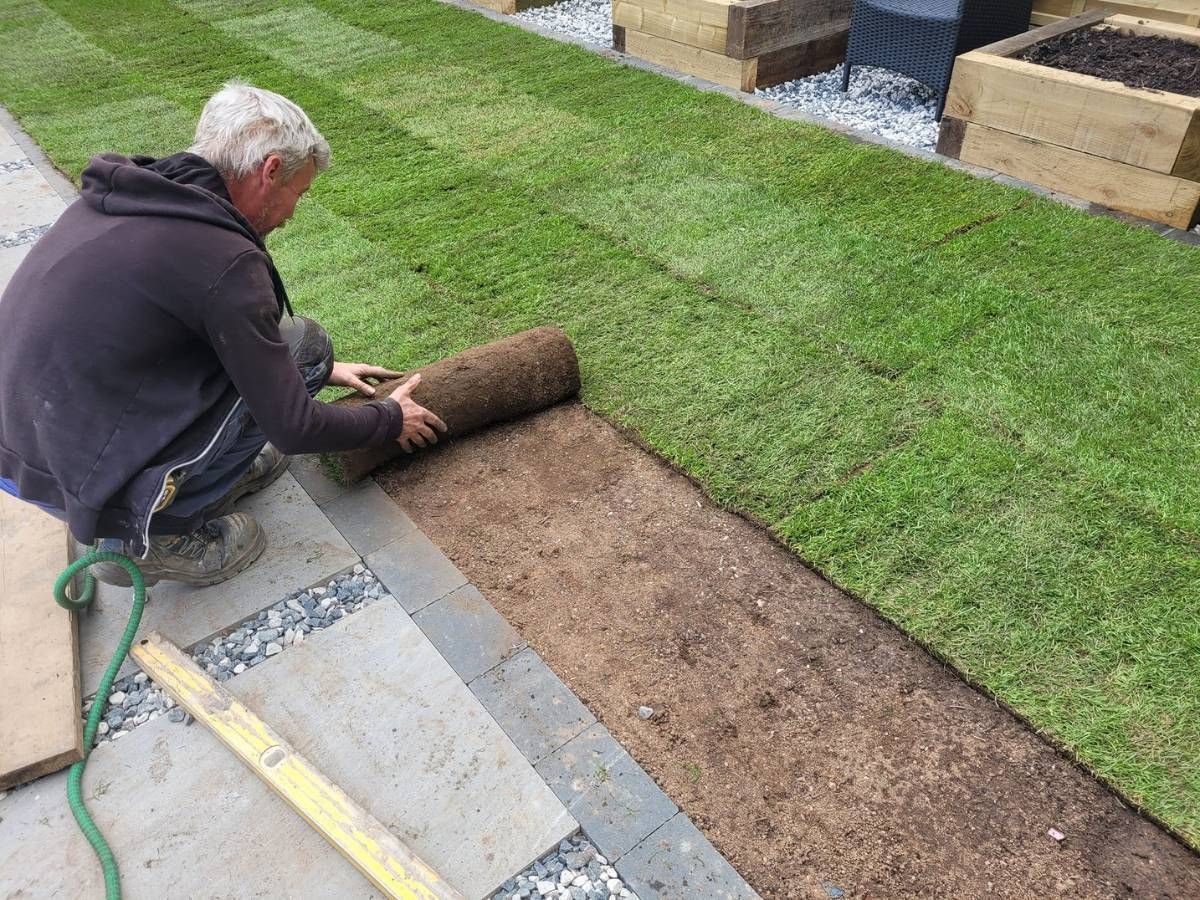 DNA Landscape gardeners relaying new turf in Solihull