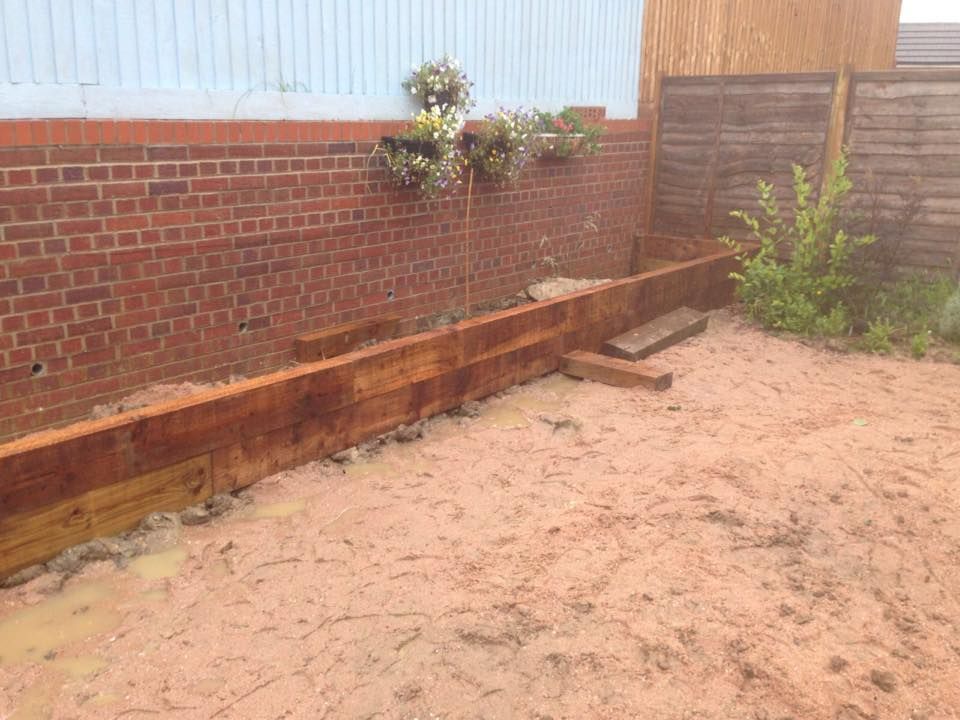 sand laid over garden drainage system