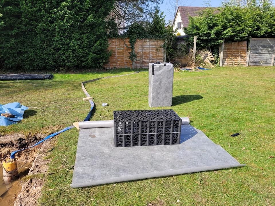 DNA Landscapes garden drainage solutions using a soakaway crate in Solihull