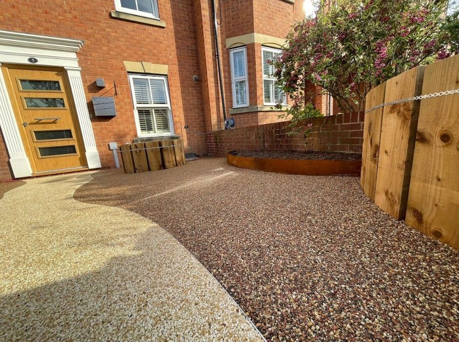 Two-colour resin driveway and path for a front garden in Warwick