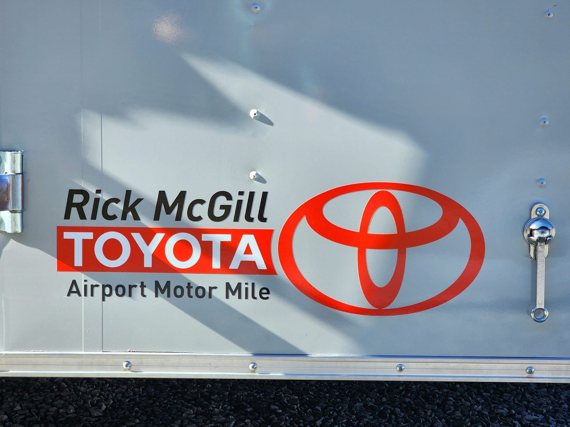 Rick mcgill toyota airport motor mile is written on the side of a vehicle