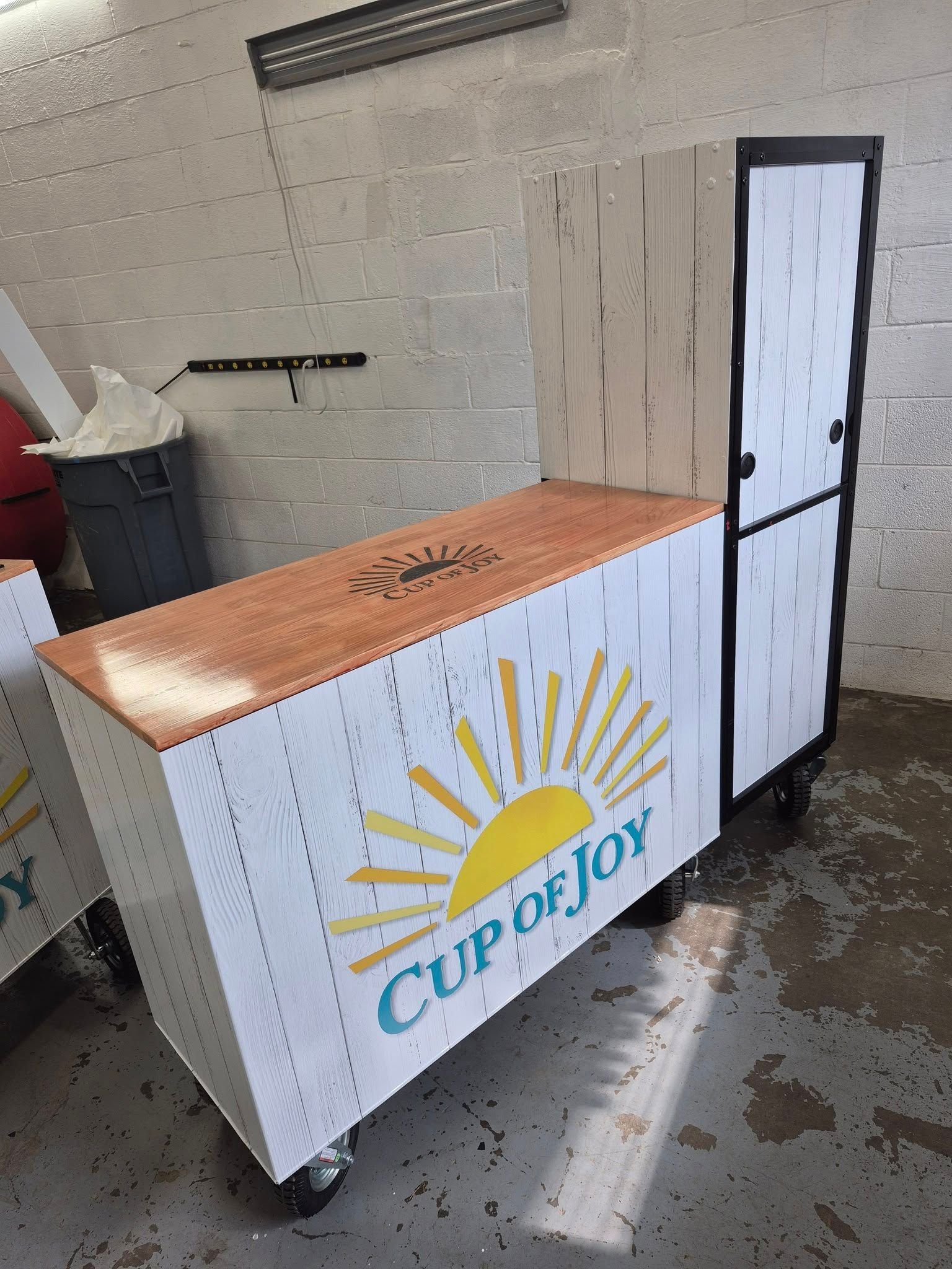 A mobile coffee cart with a 
