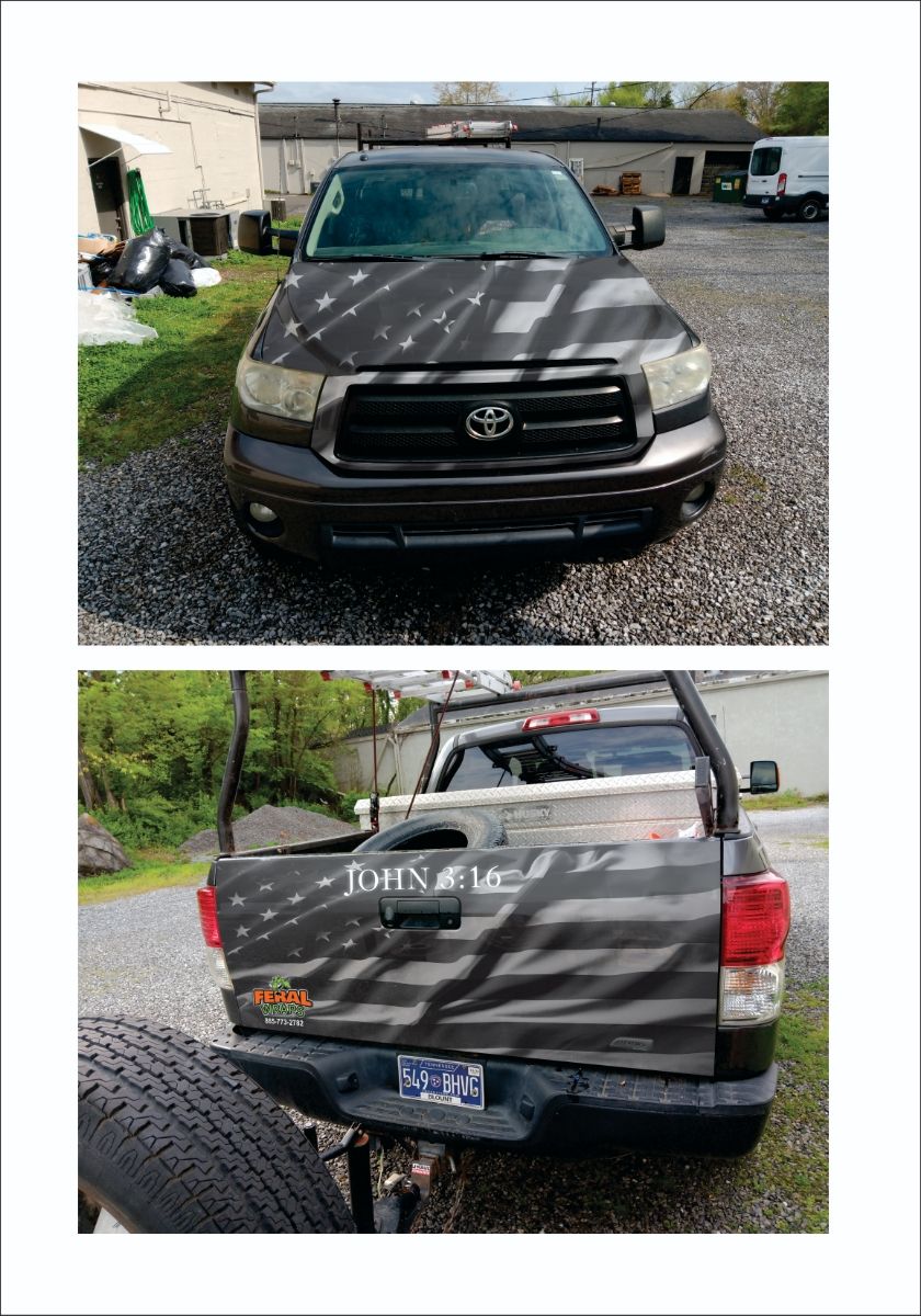 A toyota tundra truck is parked in a gravel lot.