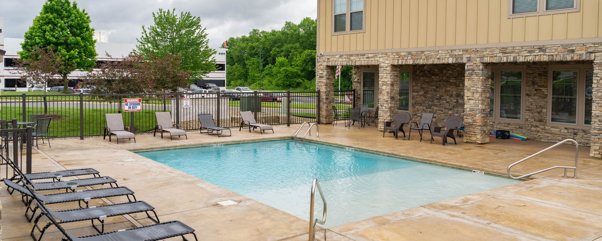 Kten place apartments pool in de soto, ks