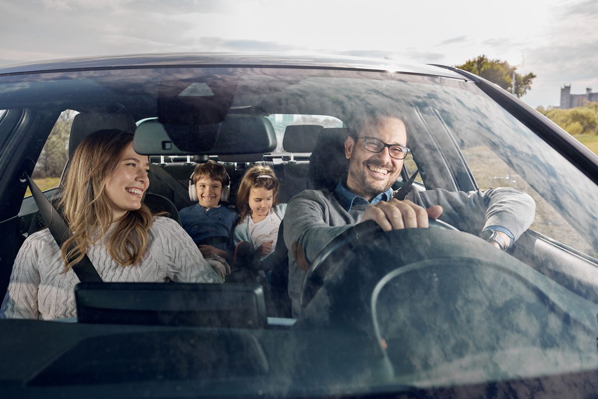 Happy Family Enjoying a Vacation by Car — San Antonio, TX — C. M. Ruffo General Insurance Happy Family Enjoying a Vacation by Car — San Antonio, TX — C. M. Ruffo General Insurance