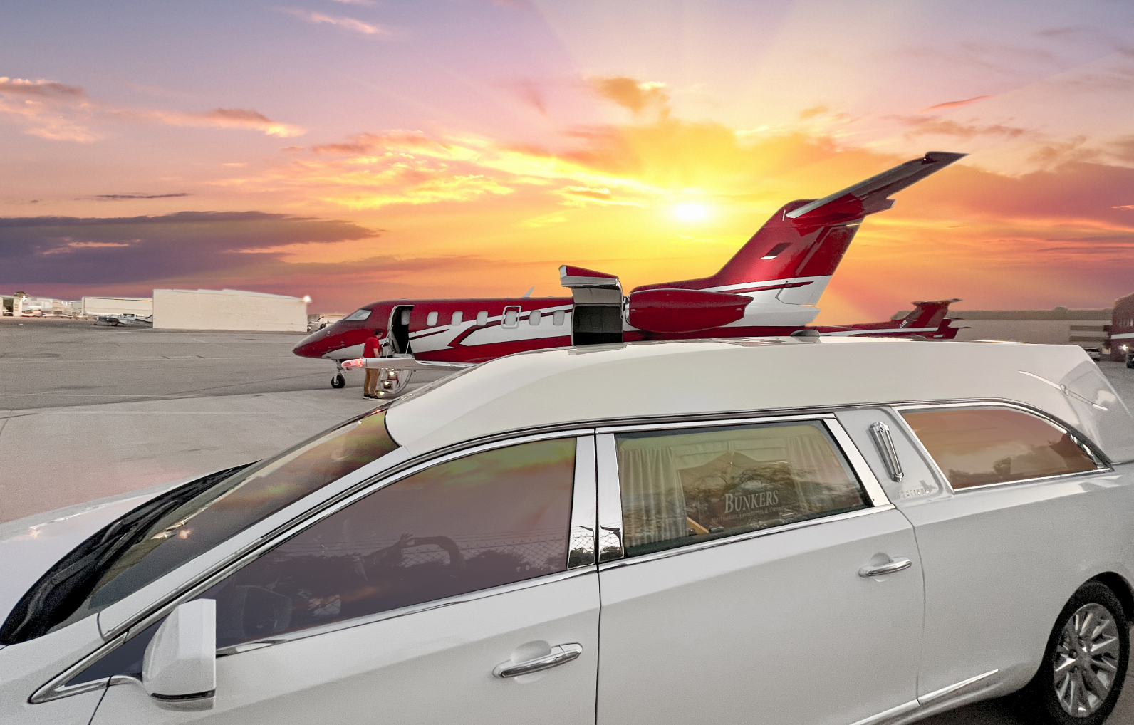A white car with a red and white airplane on top of it.