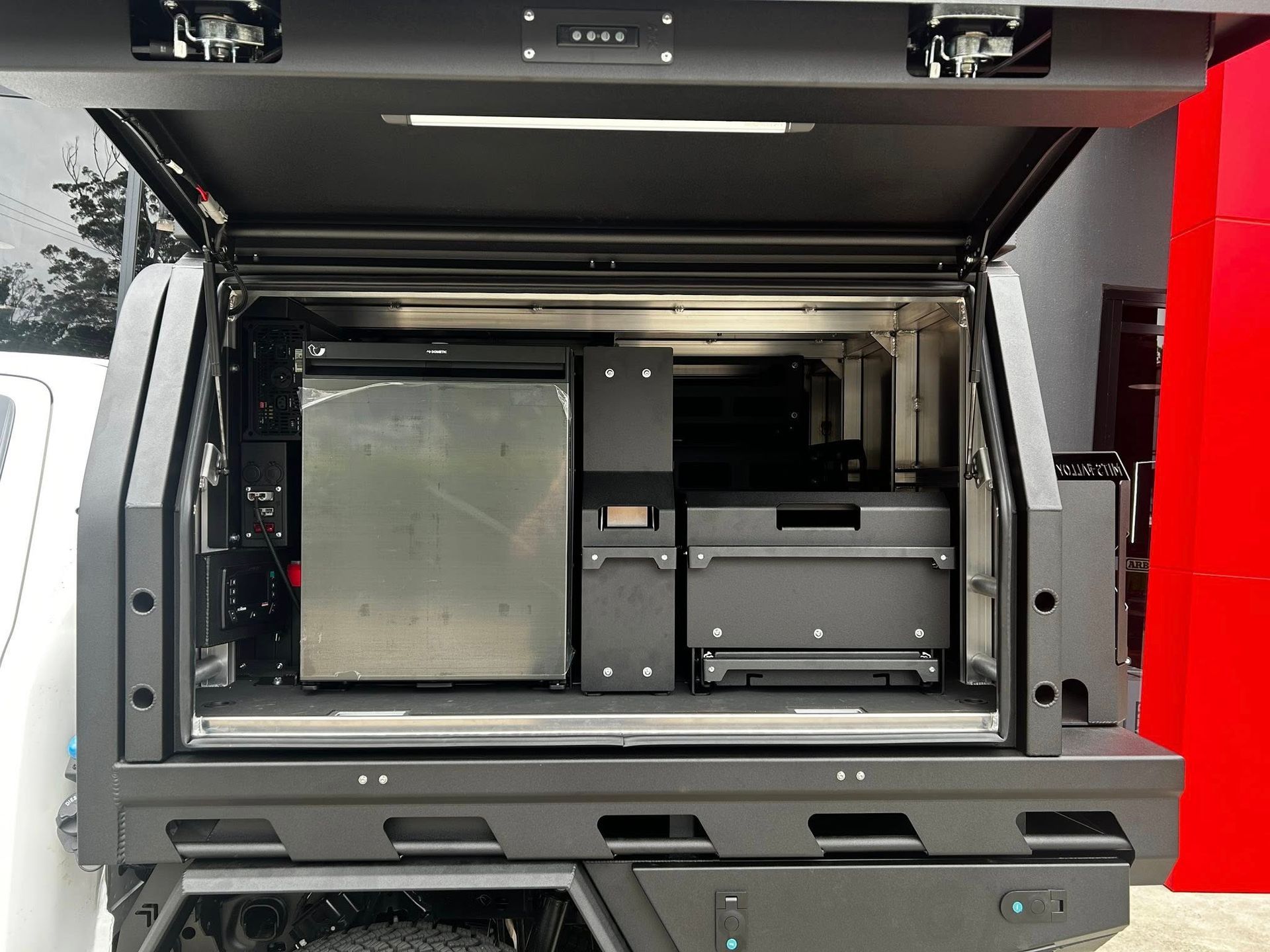 Open truck bed with built-in metal storage compartments and equipment drawers — Ol Mate 4x4 in Tuggerah, NSW