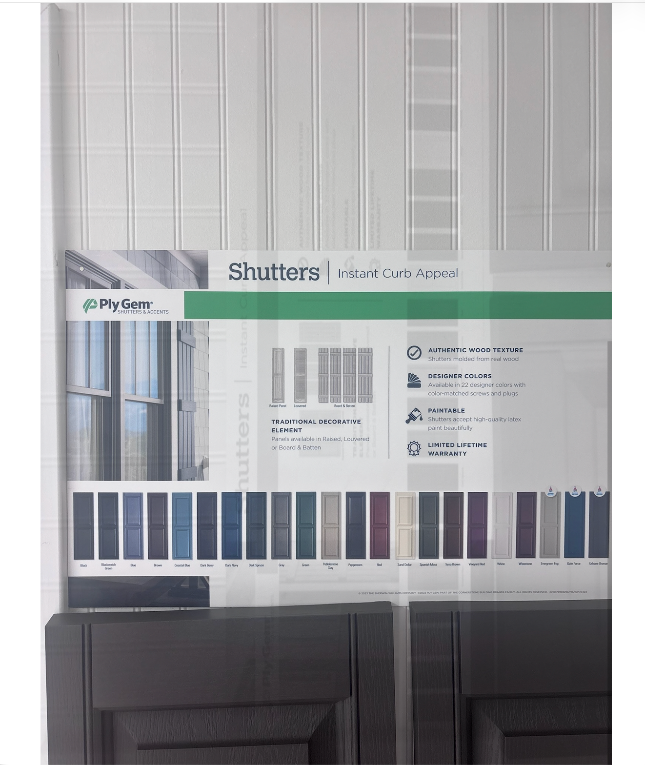 Shutter sample display board with white and gray panels and color swatches