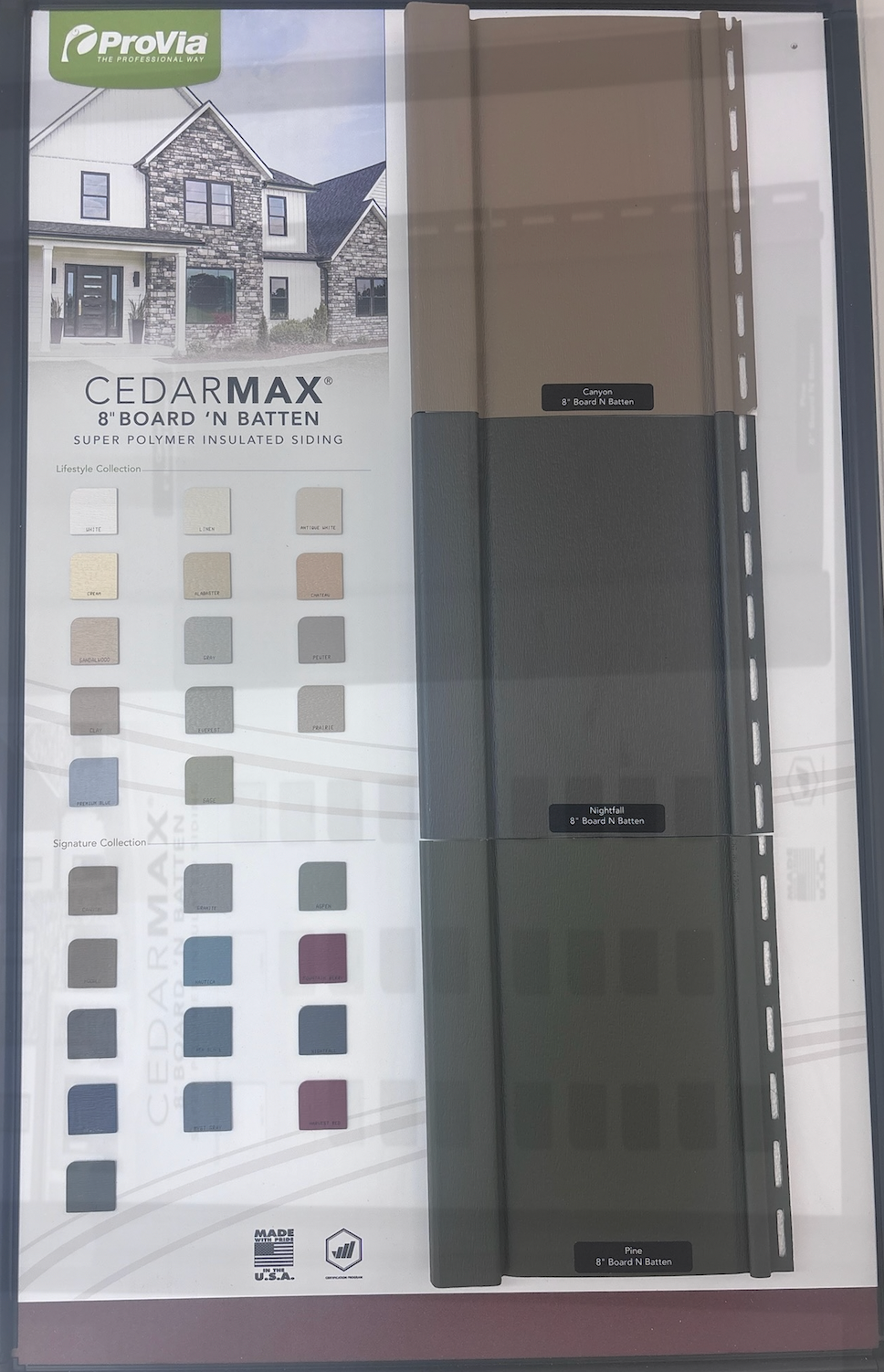 CedarMax siding sample display with gray panels and color swatches in a showroom
