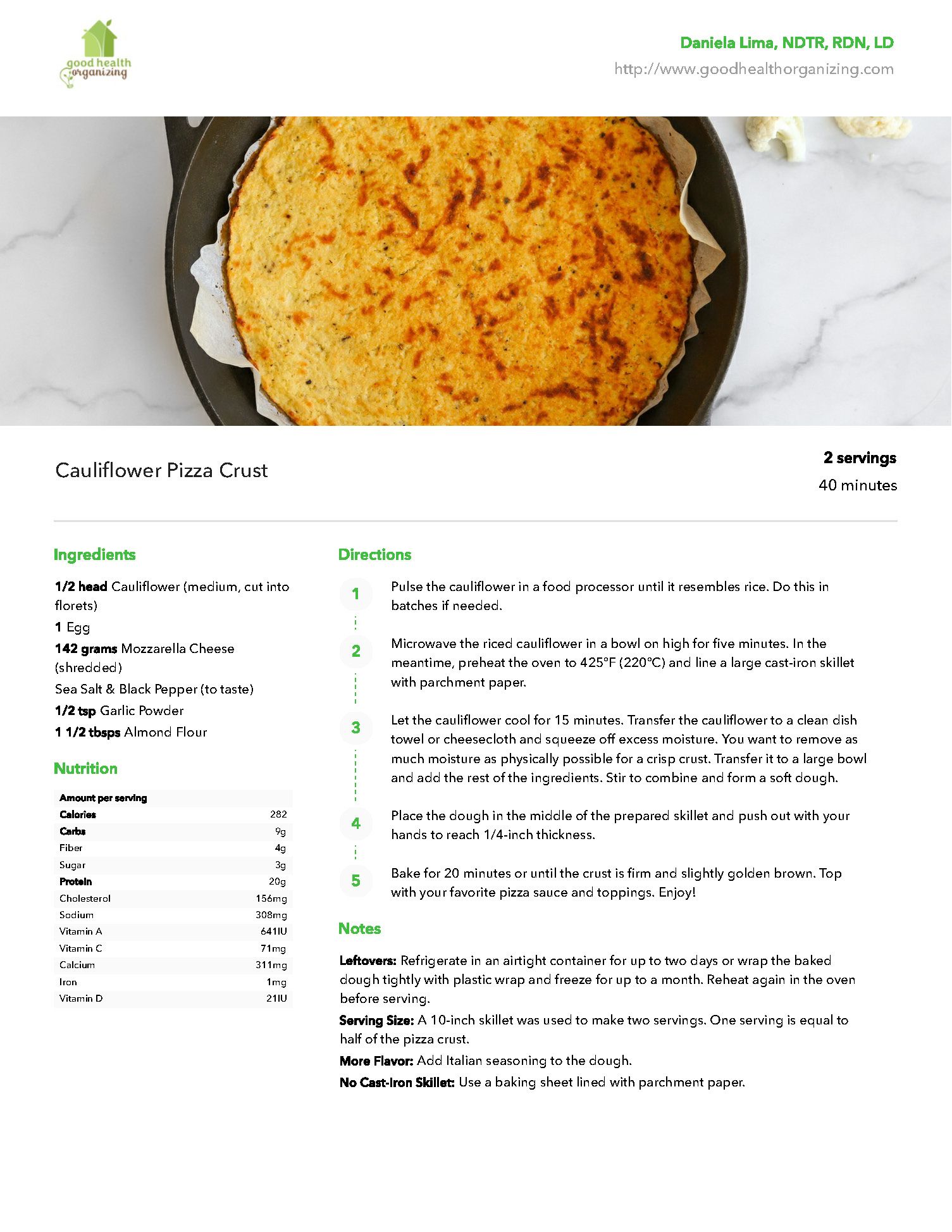 A pie in a pan on a table with a recipe on it.