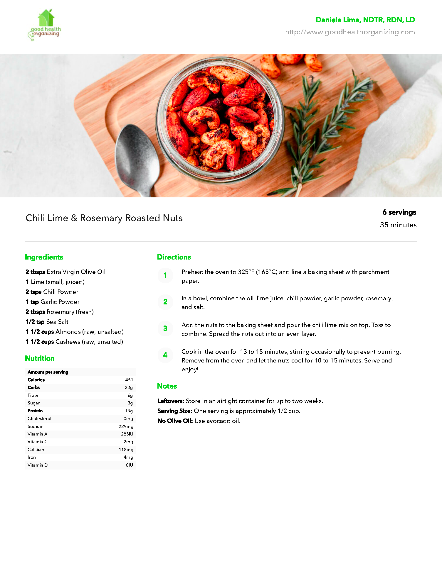 A bowl of shrimp on a wooden cutting board with a spoon.