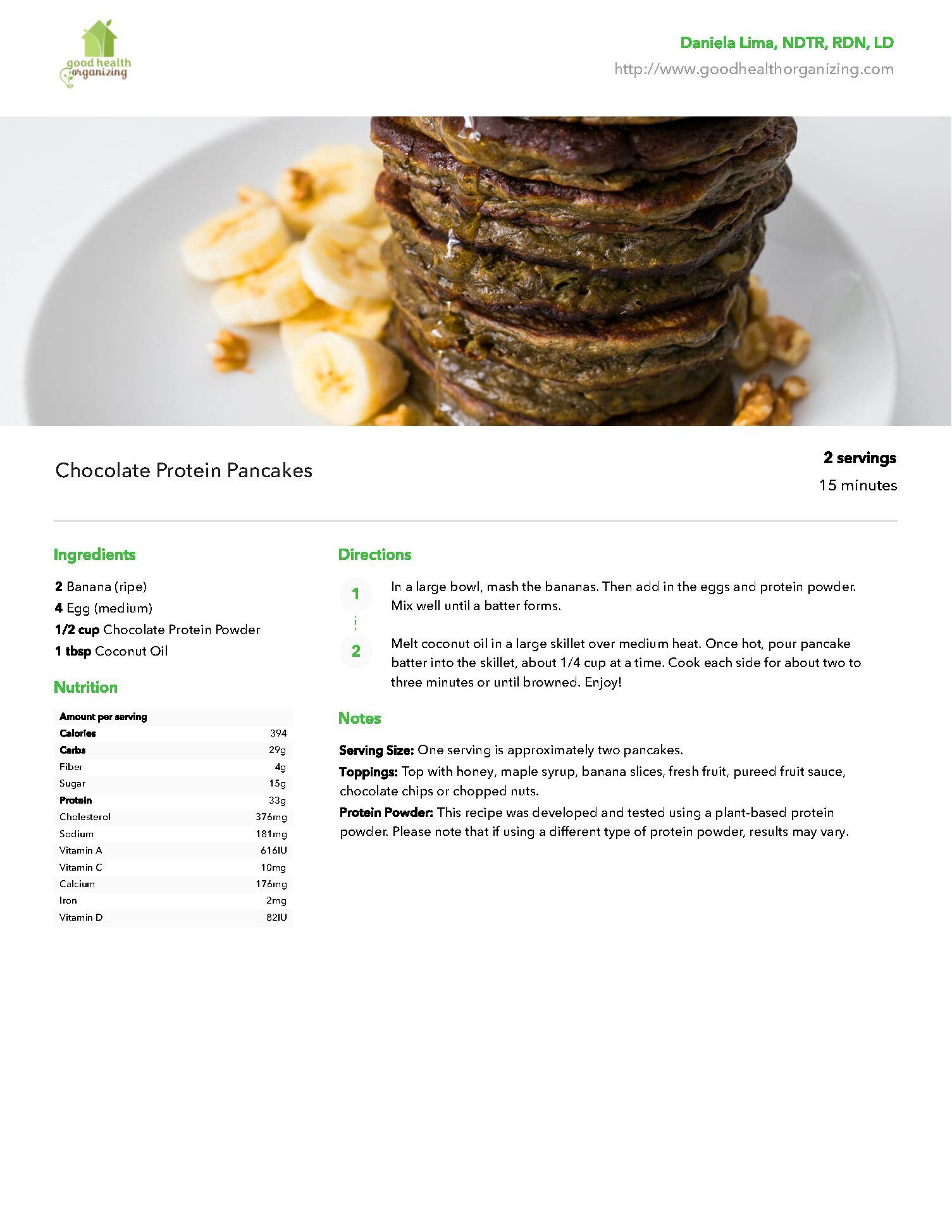 A stack of pancakes on a plate with bananas and nuts.