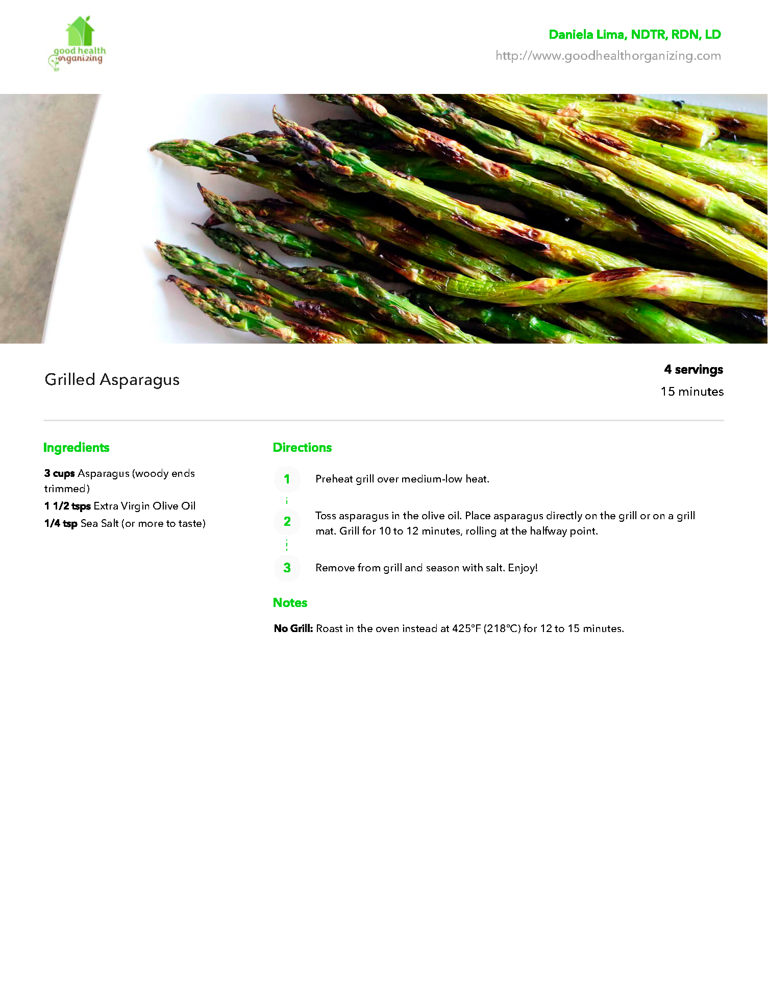 A white plate topped with asparagus and a recipe.