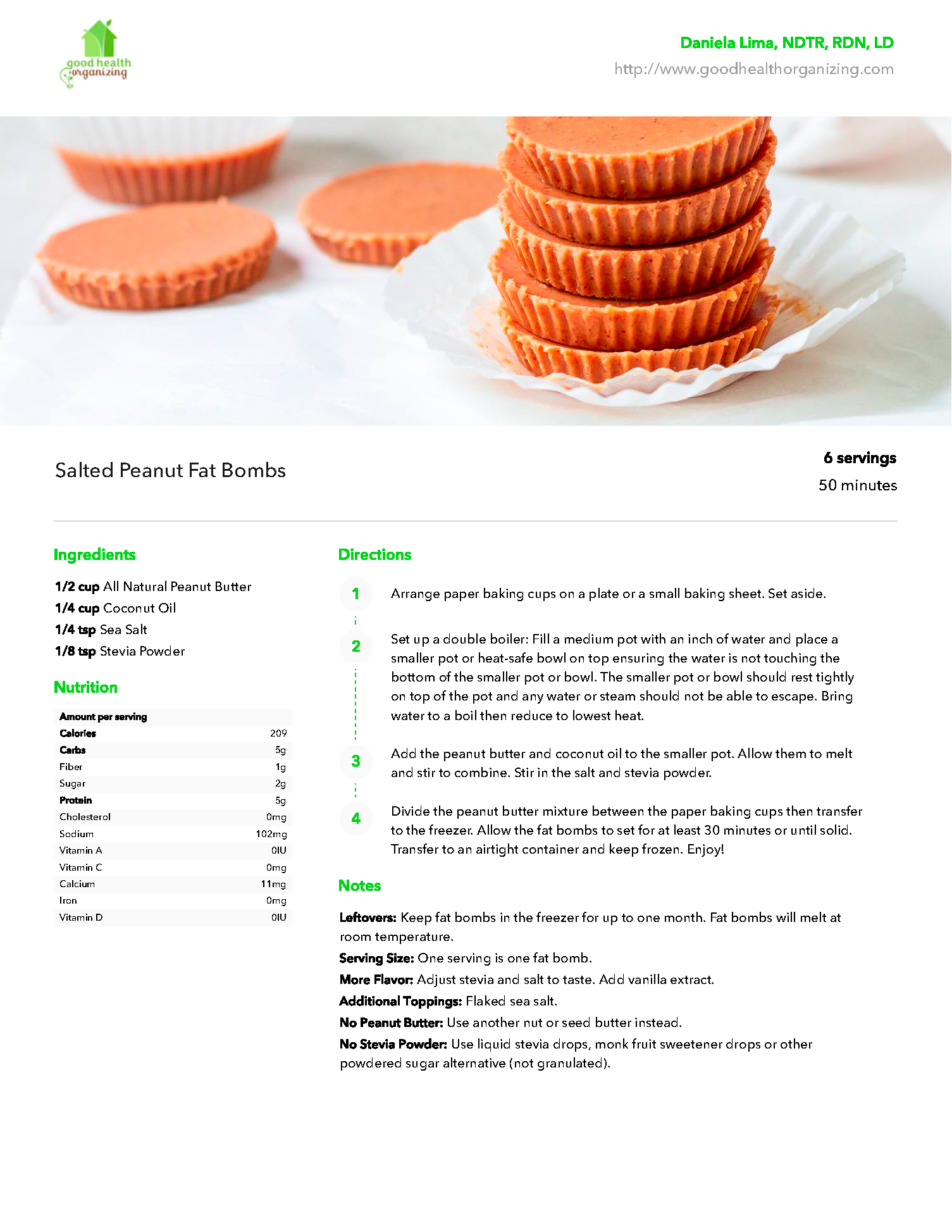 A stack of cupcakes sitting on top of each other on a paper plate.
