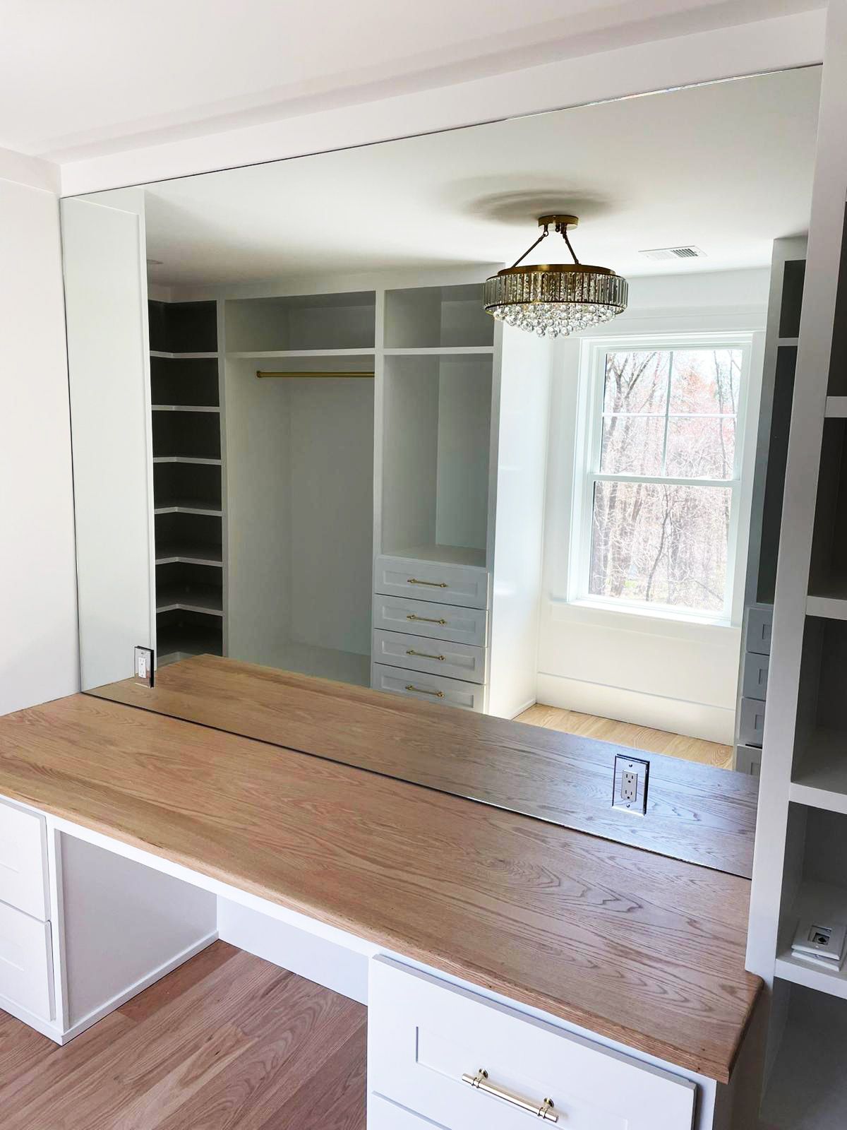 Vanity mirror providing a clear reflection for makeup application.