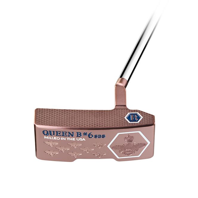 Rose gold golf putter with "Queen B" branding.