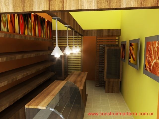Interior de cocina moderna con armarios de madera, paredes amarillas, lámparas colgantes y una isla central.