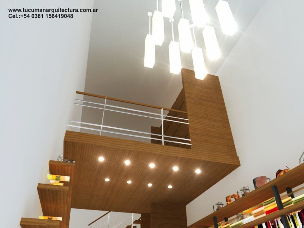 Sala de estar moderna con techo alto, barandillas blancas, detalles en madera y una lámpara de araña colgante.