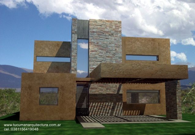 Moderna casa de piedra de dos plantas con grandes ventanales y techo plano en un paisaje de montaña.