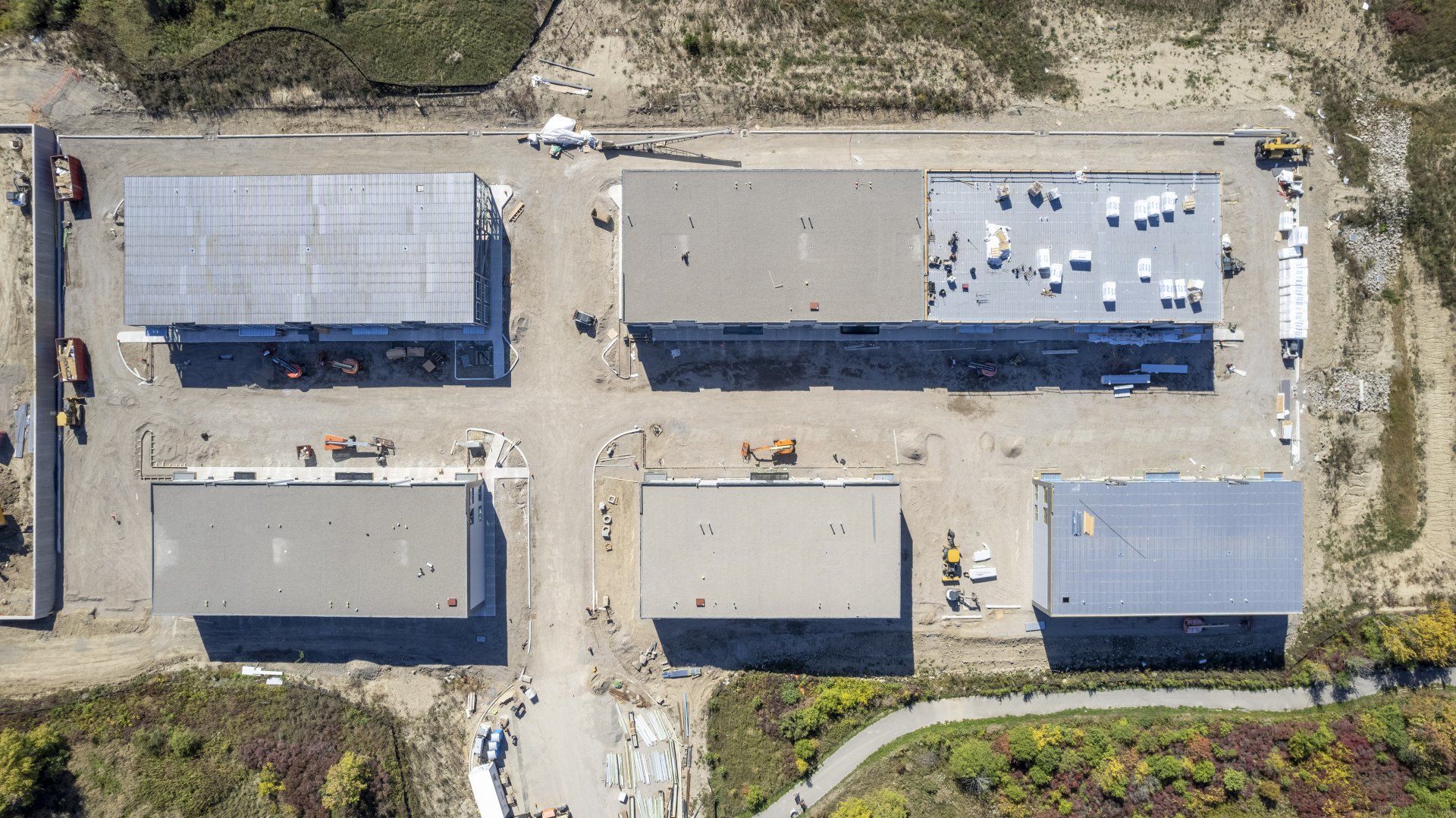 An aerial view of a large industrial area with lots of buildings.