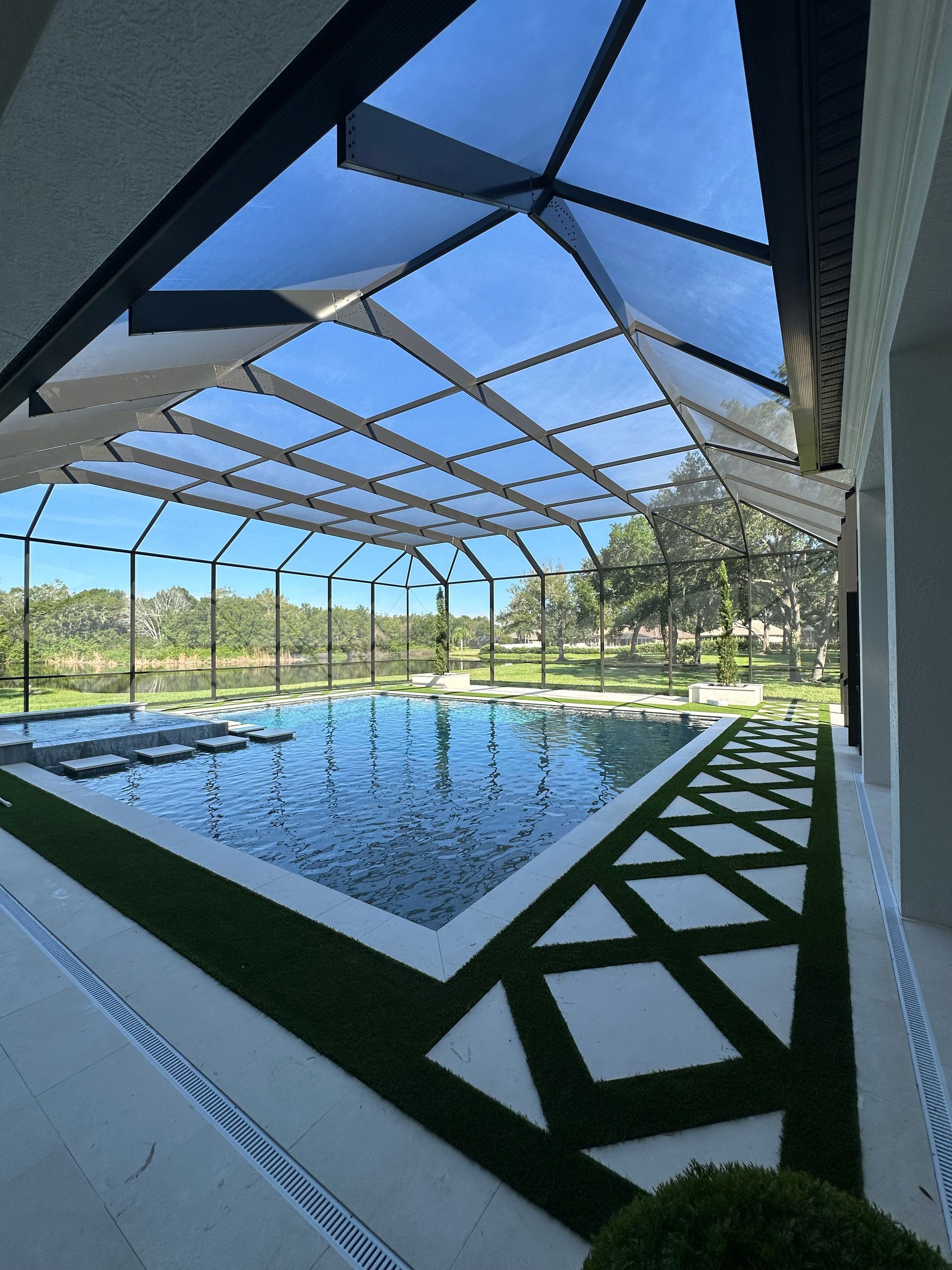 bronze mansard pool enclosure installation in Lakeland, FL.