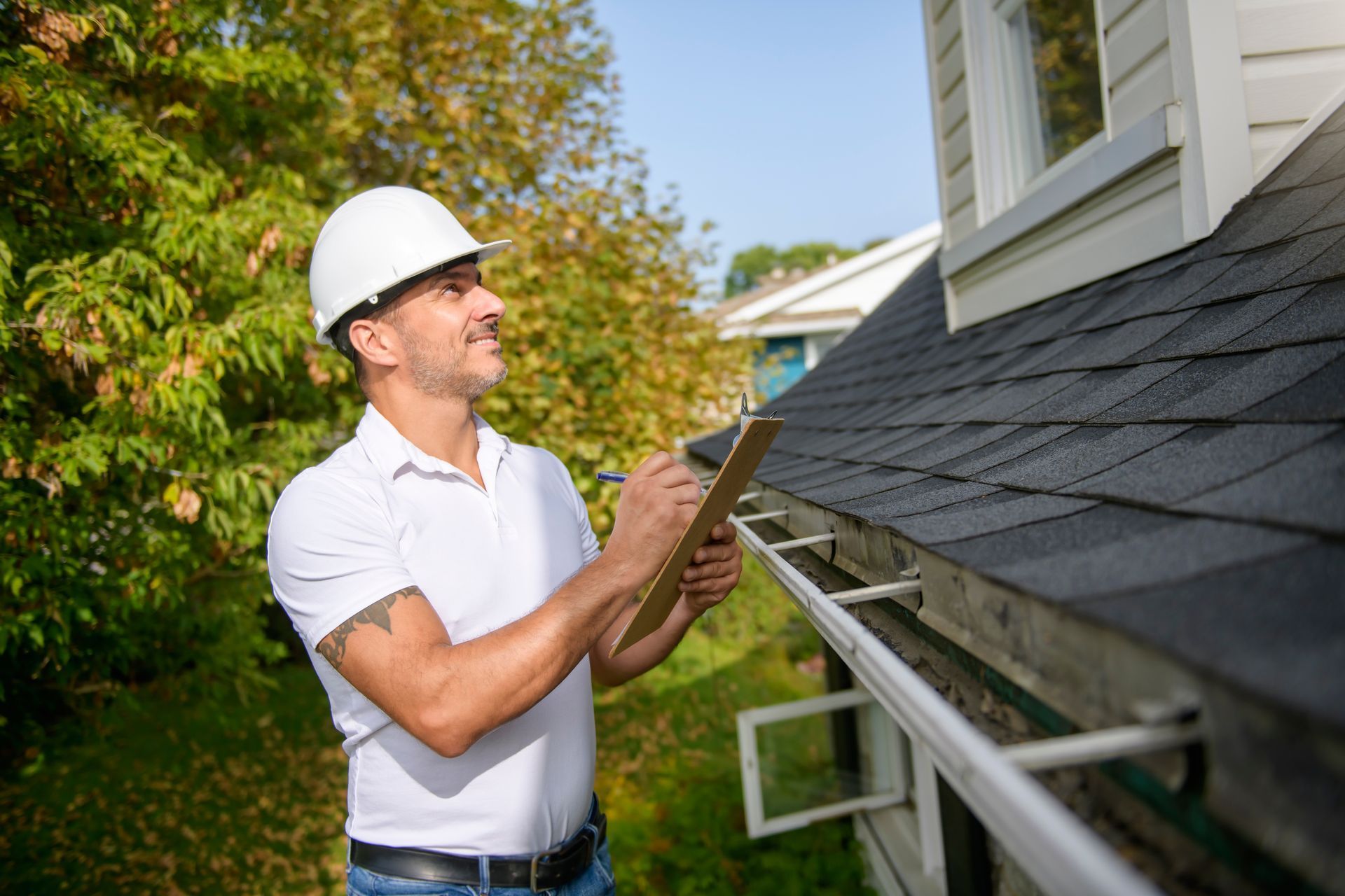 Harmon Service LLC professional roofing contractor performing a roof inspection in Lakeland, FL.