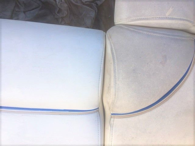 Two White Cushions With Blue Trim Are Sitting Next to Each Other — Furniture & Auto Pride In Port Macquarie, NSW