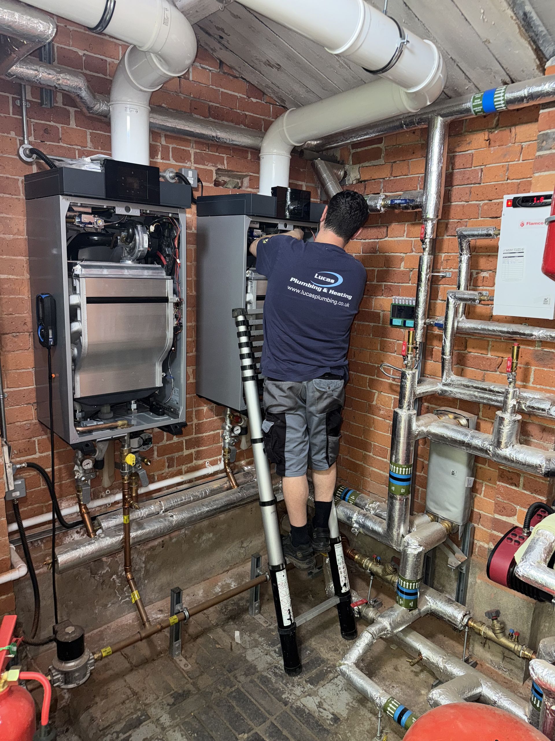 Gas Safe engineer servicing a commercial gas boiler in Reading