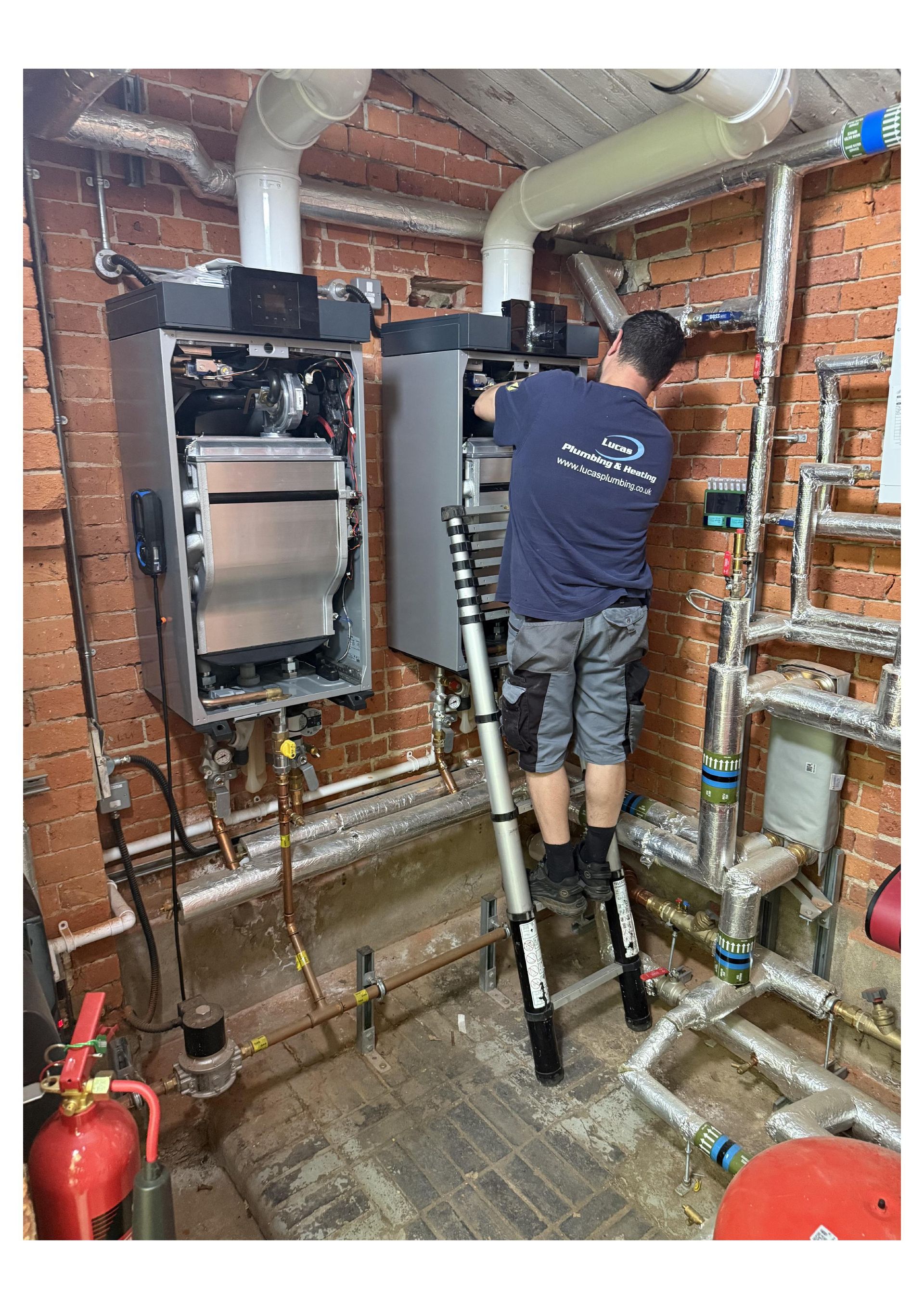 Heating engineer carrying out flue gas analysis during a service
