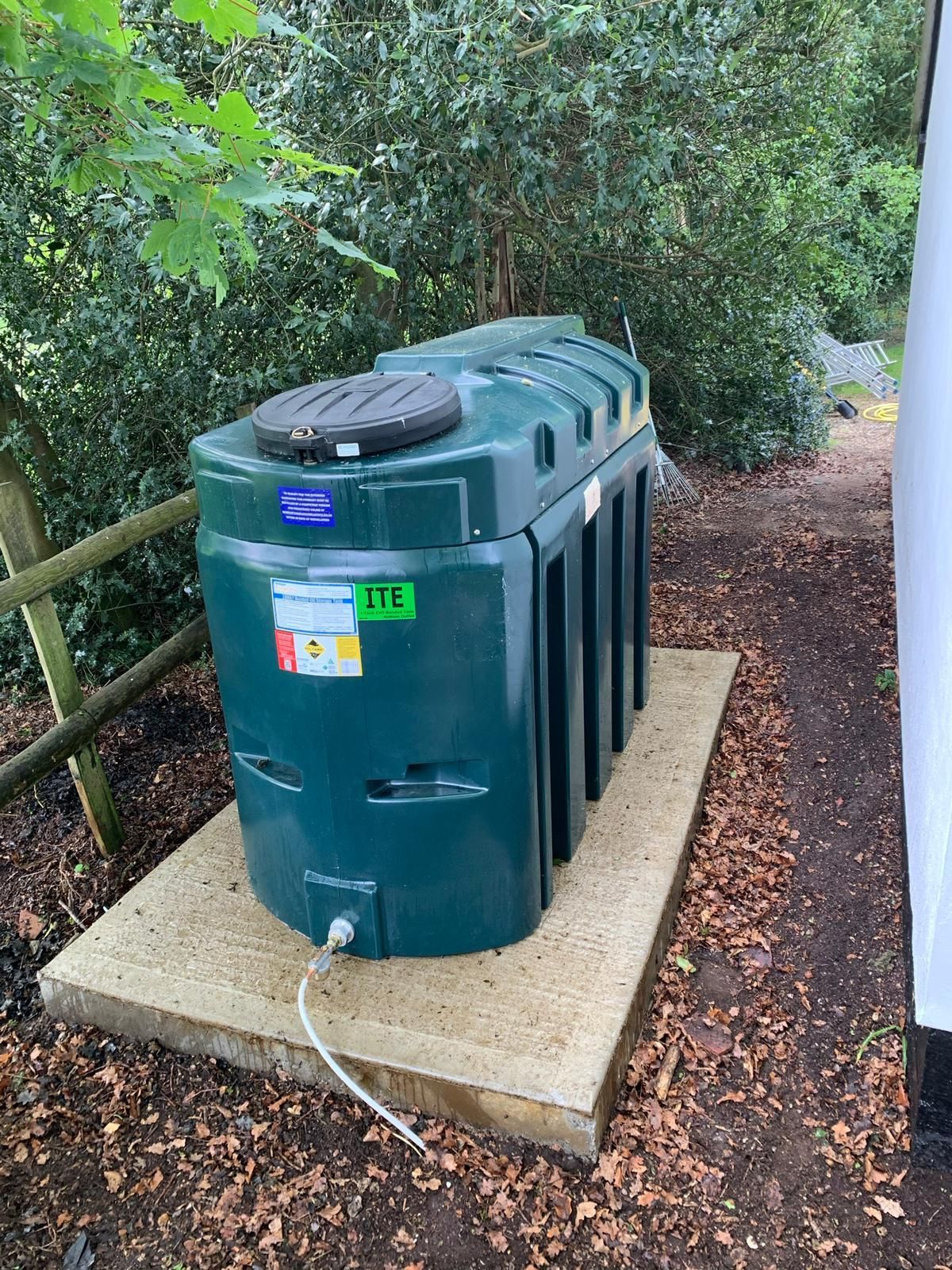 New domestic oil tank installation with concrete base