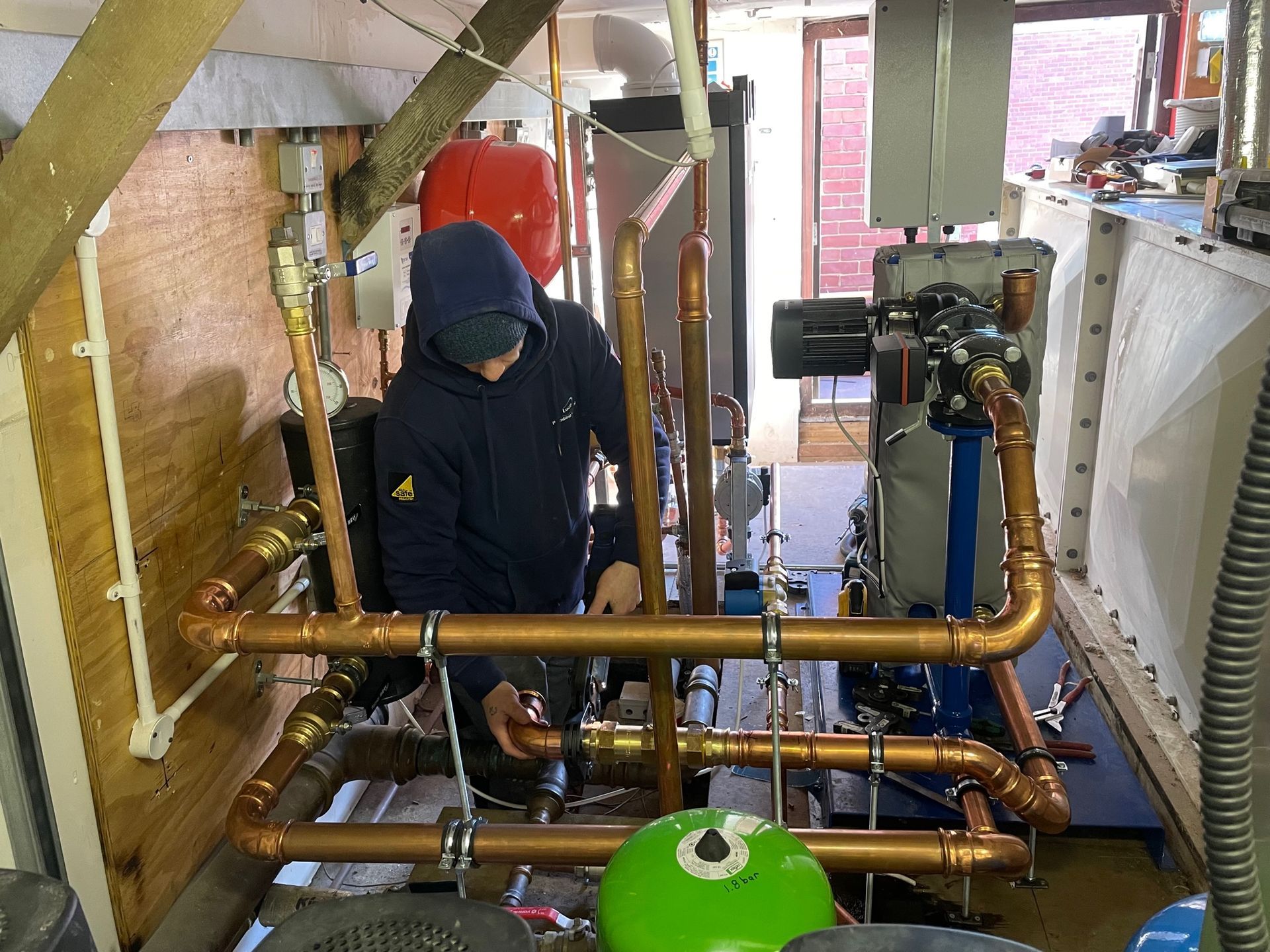 Emergency plumber attending leak in Woodley care home