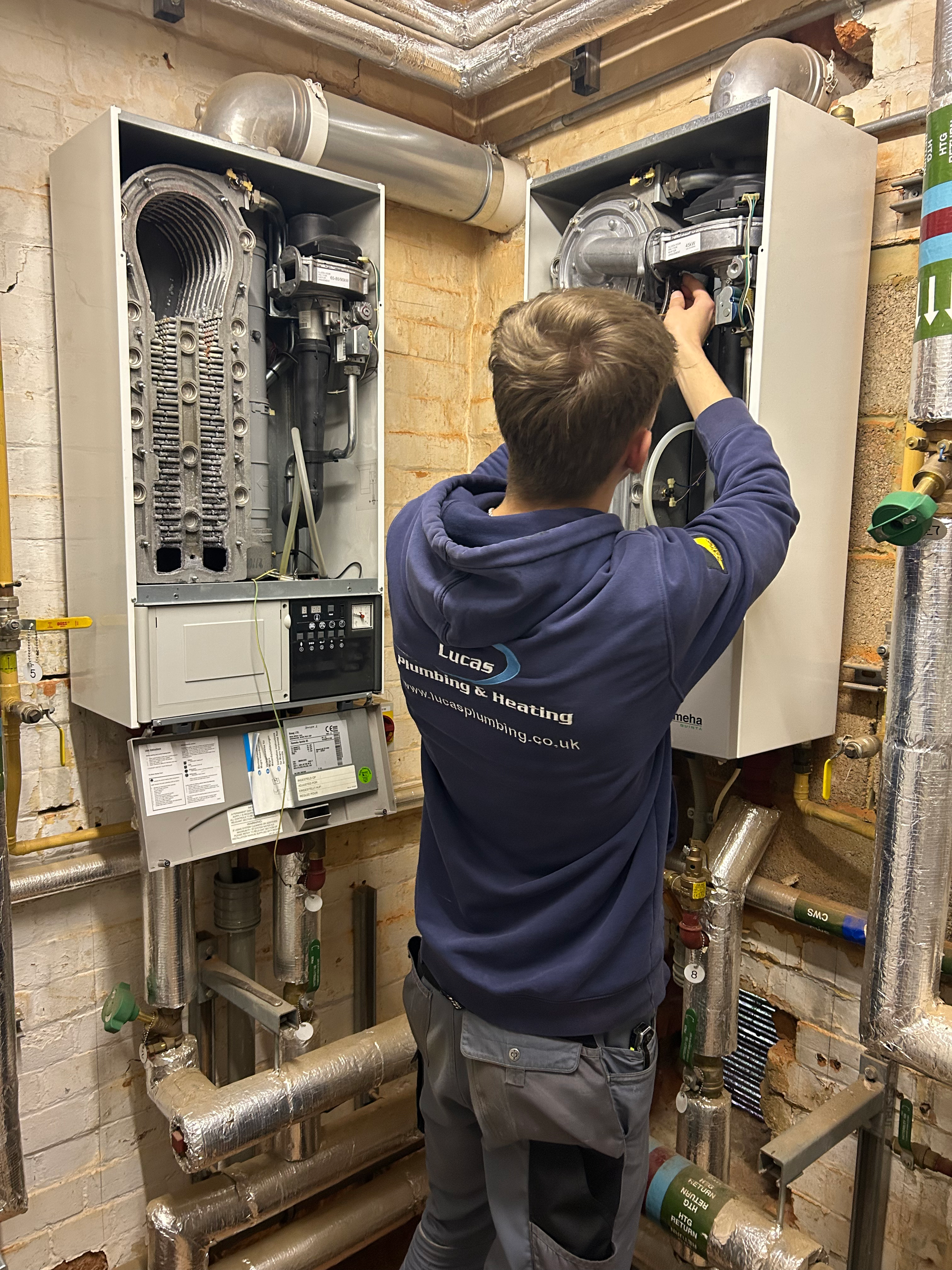 Boiler service checklist being completed by engineer