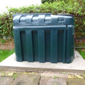 OFTEC-certified engineer performing oil tank replacement