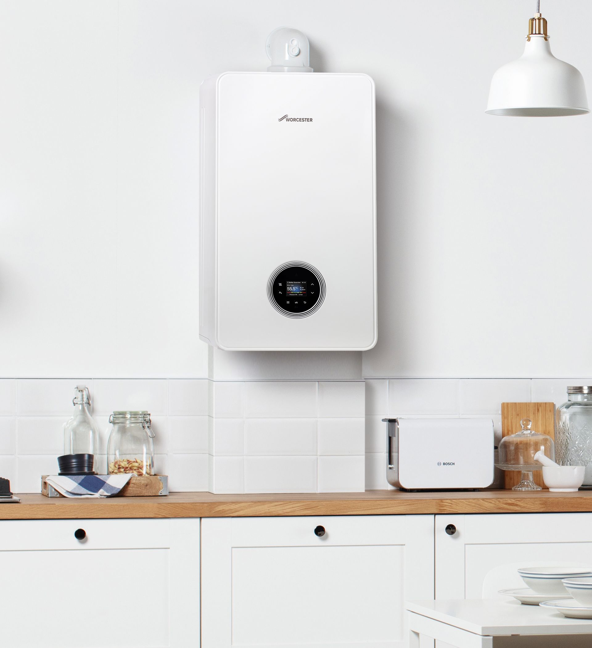 Gas Safe engineer servicing an LPG boiler in a rural home