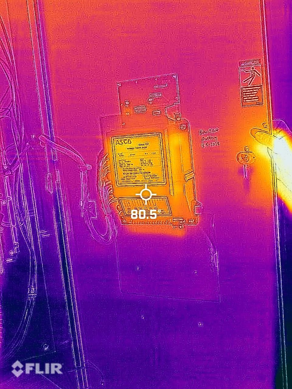 A thermal image of a building taken by a flir camera.