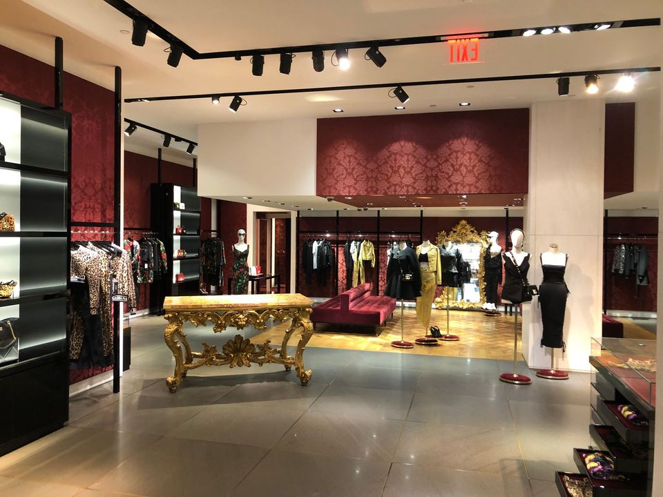 There is a red exit sign in the middle of the room.