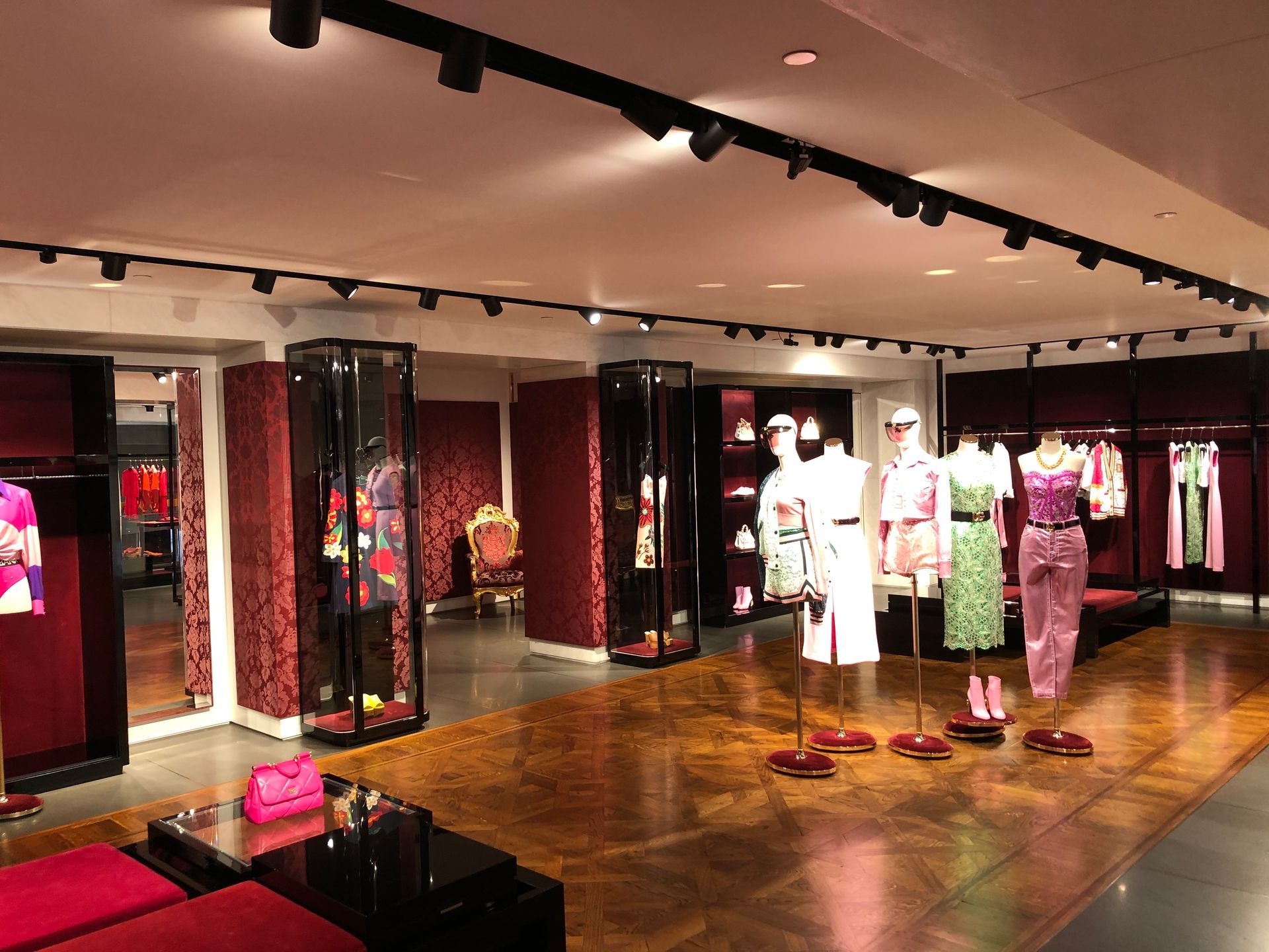 A store filled with lots of clothes and mannequins.
