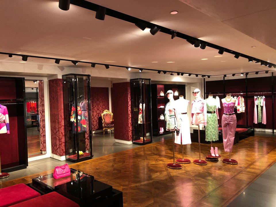 A store filled with lots of clothes and mannequins.