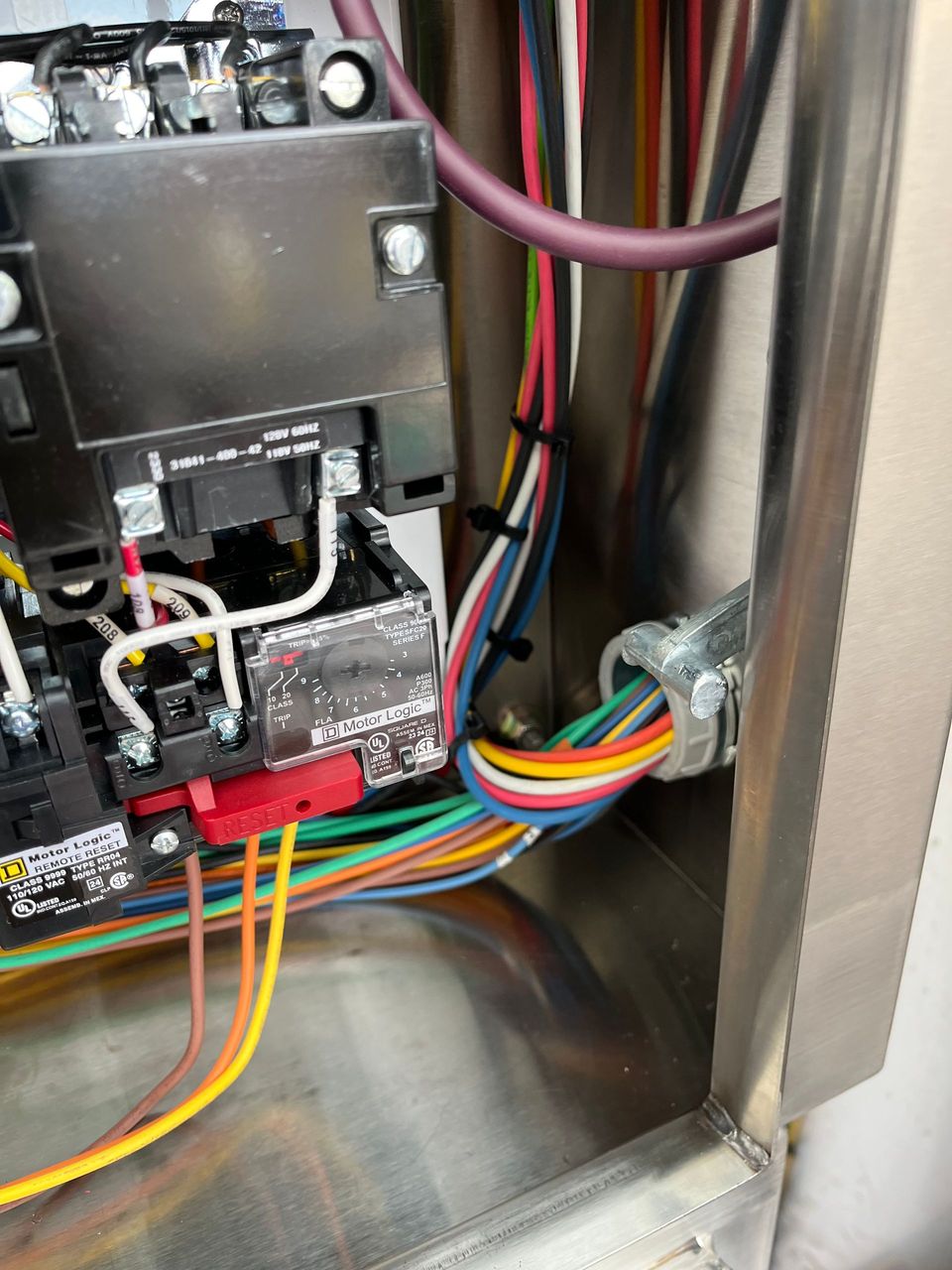 A box with a bunch of wires coming out of it