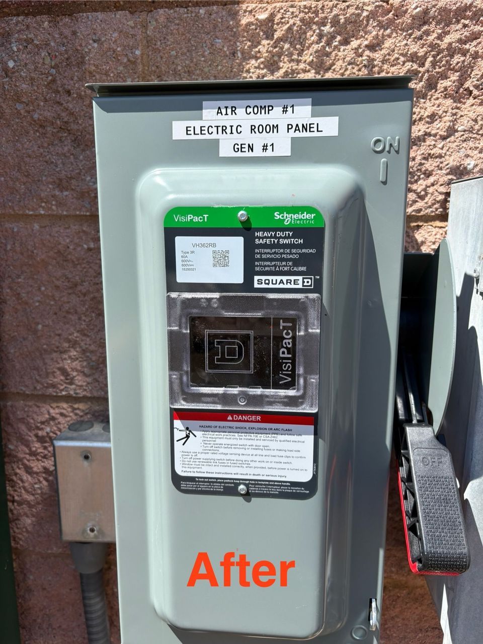 Gray electrical breaker panel mounted on a wall, labeled “After” in orange.