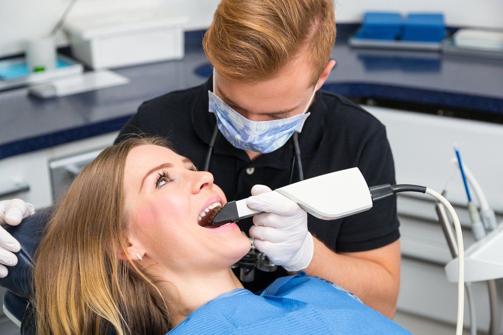 Dental technology | CEREC scanner | dentist near you | dentist scanning a patients mouth with a 3d scanner for cerec | Dr. Ray T Chow Dentistry | Victoria Dentist