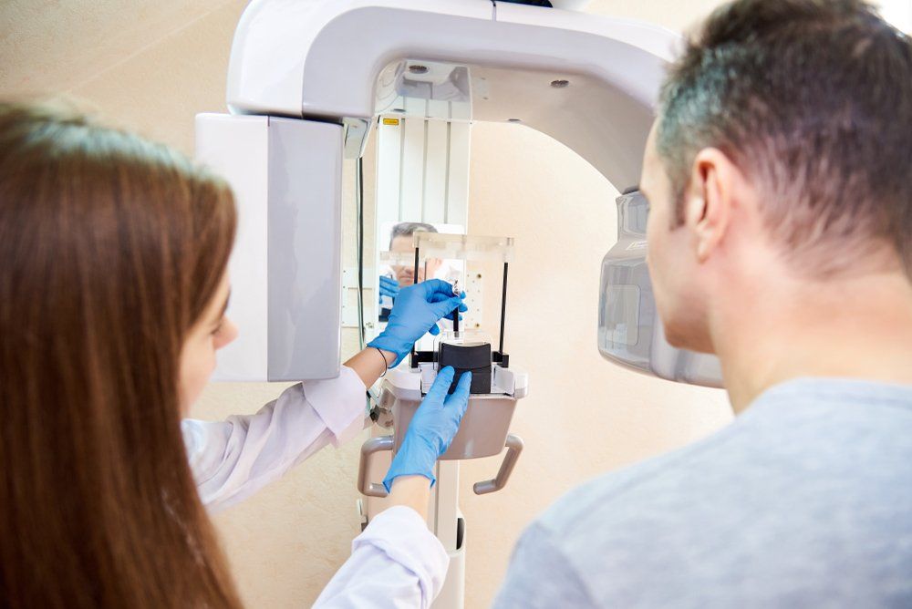 Dental technology | x-ray machine | dentist near you | patient getting a dental x ray | Dr. Ray T Chow Dentistry | Victoria Dentist