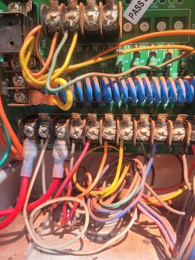 A bunch of wires are connected to a circuit board.