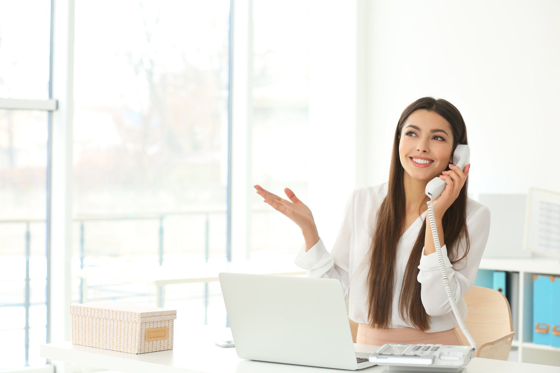 beautiful young woman talking by telephone