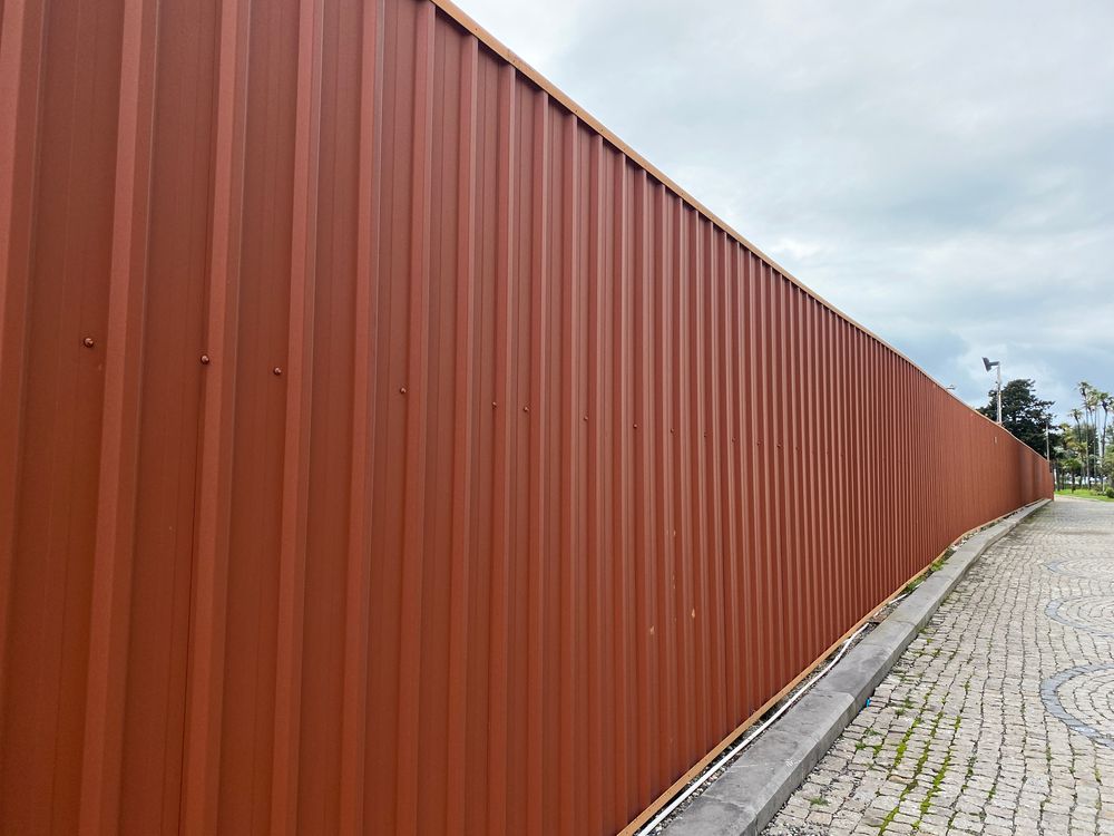 Corrugated Metal Fence — McLuckie Metal Roofing In Bankstown, NSW