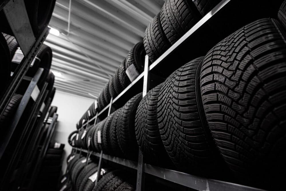 A Warehouse Filled With Lots Of Tyres On Shelves — Tyrepower Innisfail In Tully, QLD