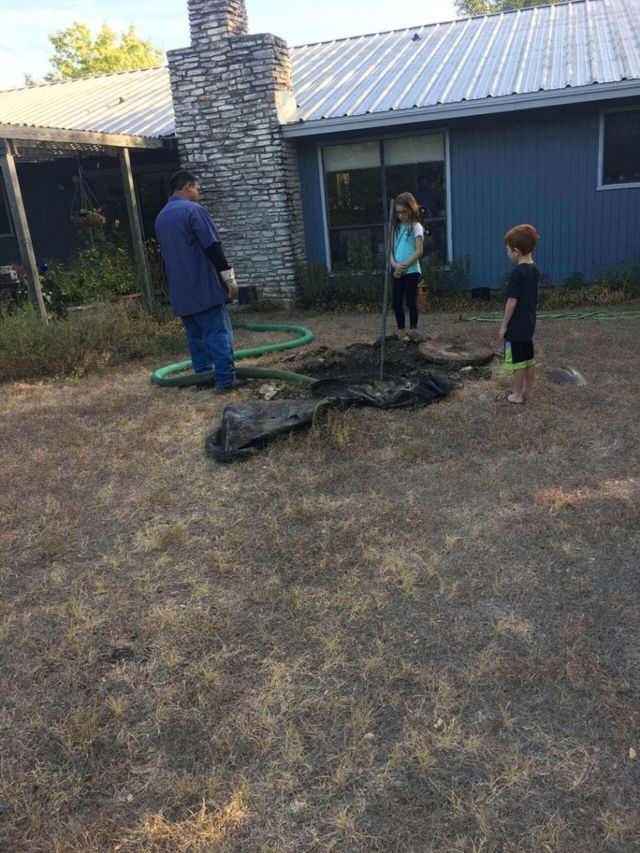 Open Backyard Septic Tank — San Marcos, TX — L & L Septic & Grease Trap