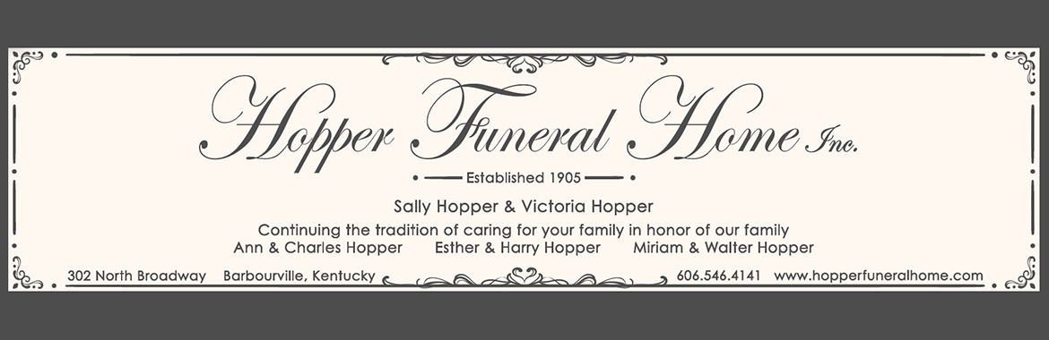 Hopper Funeral Home sign with elegant script on a light background, listing funeral home services and contact details